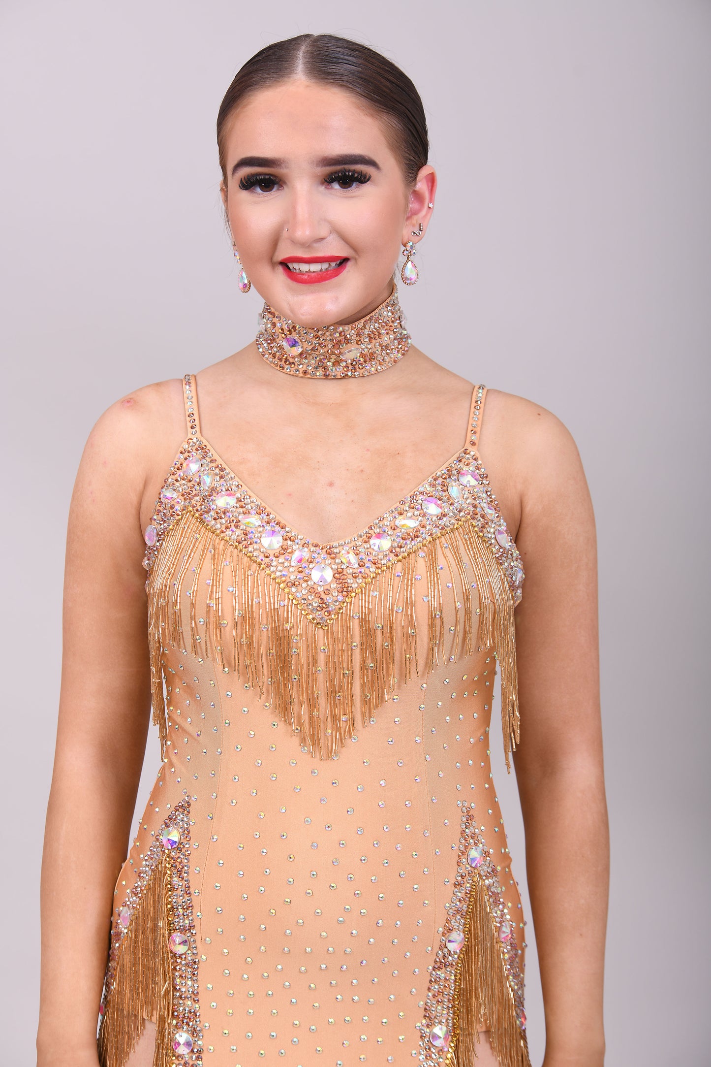 049 Light Gold & Chocolate Fringed Latin Dress. Bugle beading detail to the chest & hips. Stoned in Aurum, smoked topaz & sunshine.