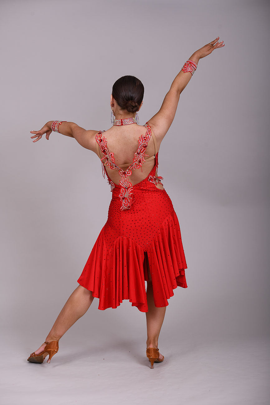 206 Red Lycra Dress with super full skirts. Motif detailing to back. Decorated with Siam bead droppers, cut out sides decorated in Siam & AB stones