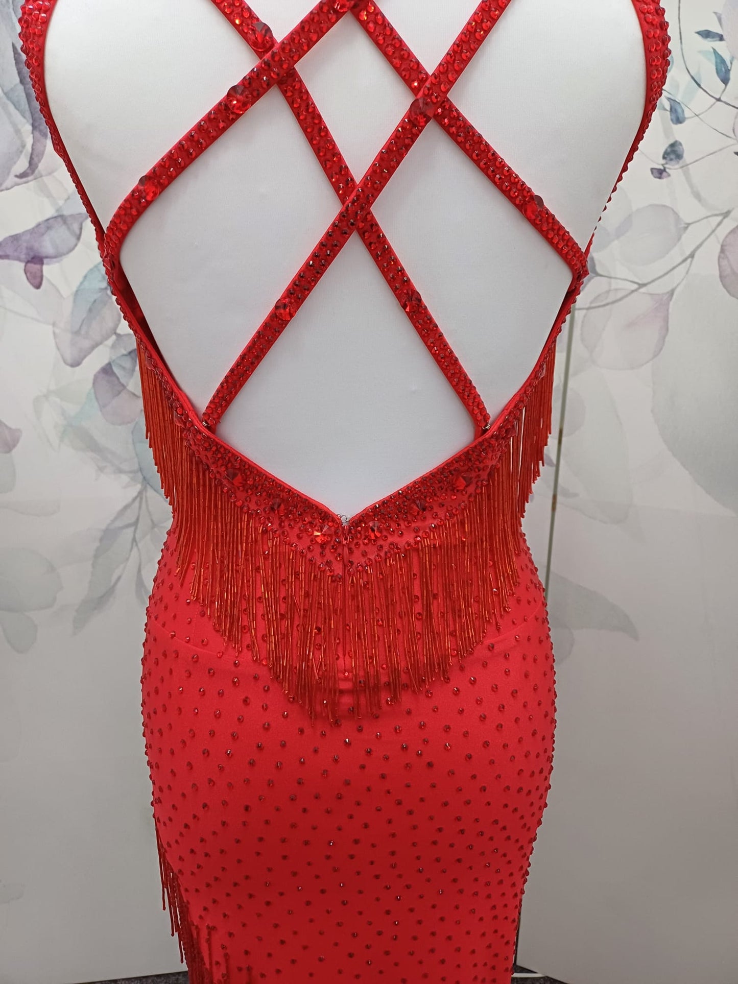 41L Red Latin Competition Dance Dress. Stoned in light Siam with strapping feature to the back & front. Bead droppers added to the hem for movement & upper chest.