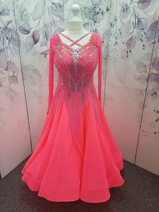 66B Coral Competition Ballroom Dance Dress. Striking decoration in AB, Coral & Coral AB. Strappy detail to upper chest & back. High back for option to wear own Bra. Detachable Floats ❤️Showroom Appointments Available❤️
