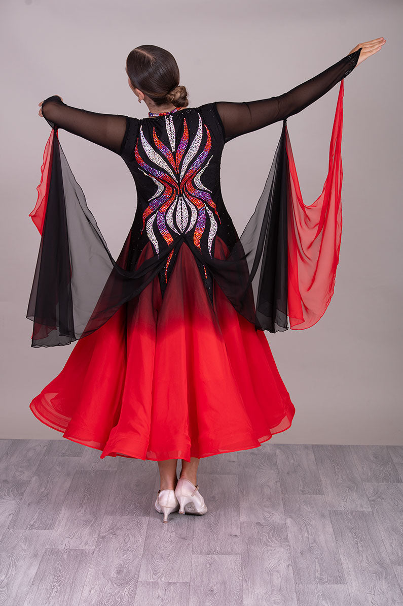 39B Red Black & Orange Ombre Competition Ballroom/Sequence Dance Dress. Ombre stoning in Oranges through to AB. Black & Red Ombre skirts with full back coverage. Detachable Floats complete this beautiful dress