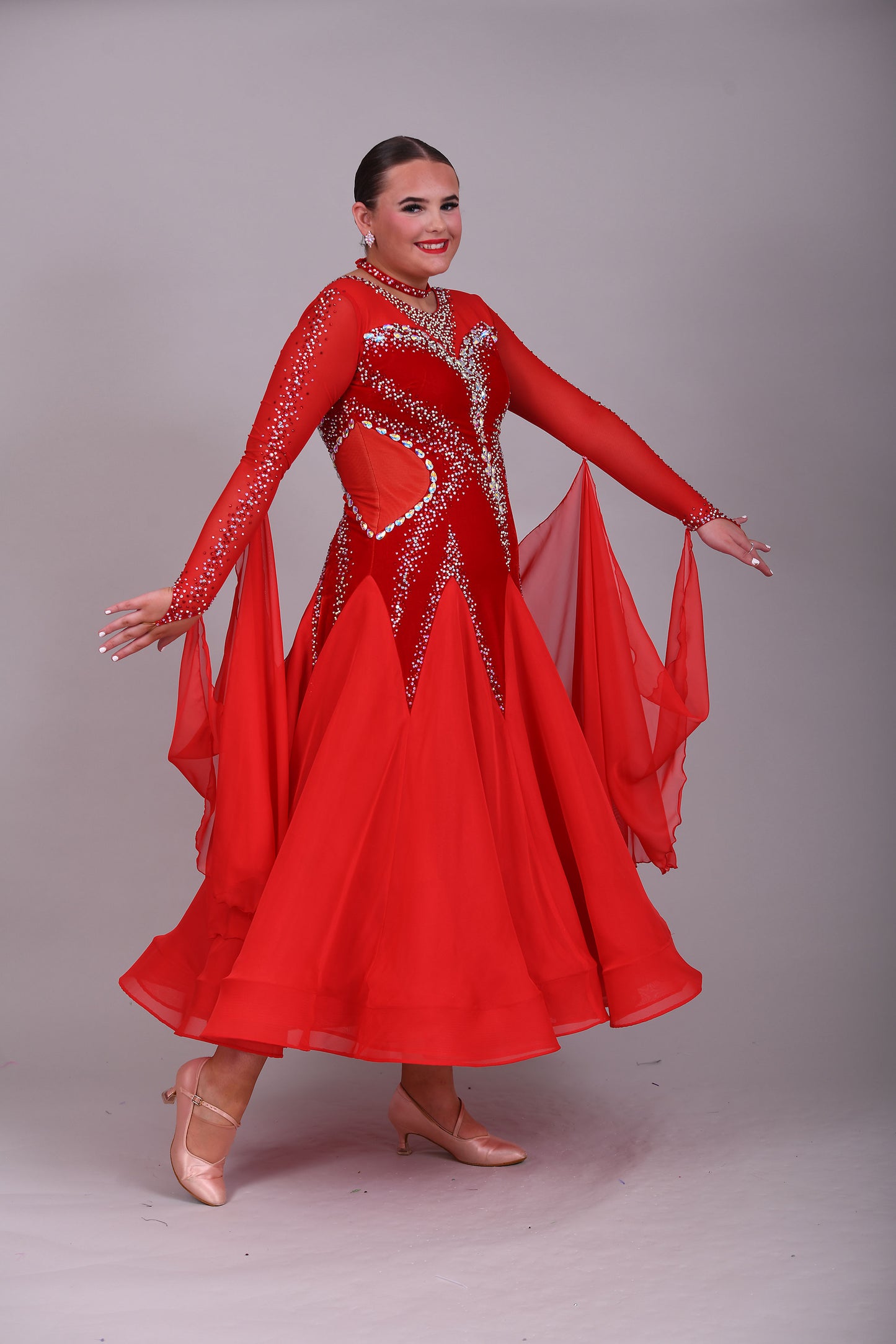 055 Red Competition Ballroom Dance Dress. Red Velvet Panels to the bodice. Heavily decorated in Siam & AB