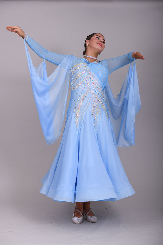 007 Light Blue Competition Ballroom Dance Dress. Heavily stoned in AB & Blue. Mesh overlay to one side of the bust continuing round to the back. Comes with detachable floats.