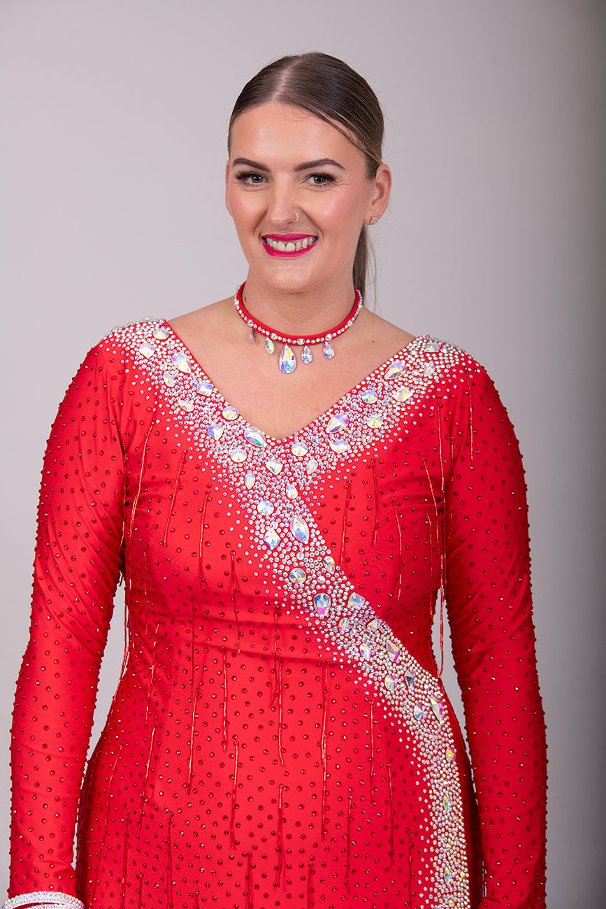 305 Striking Rich Red Latin Competition Dance Dress. Very Flattering style Dress. Red bead droppers all over with Siam stones. Heavily decorated with AB