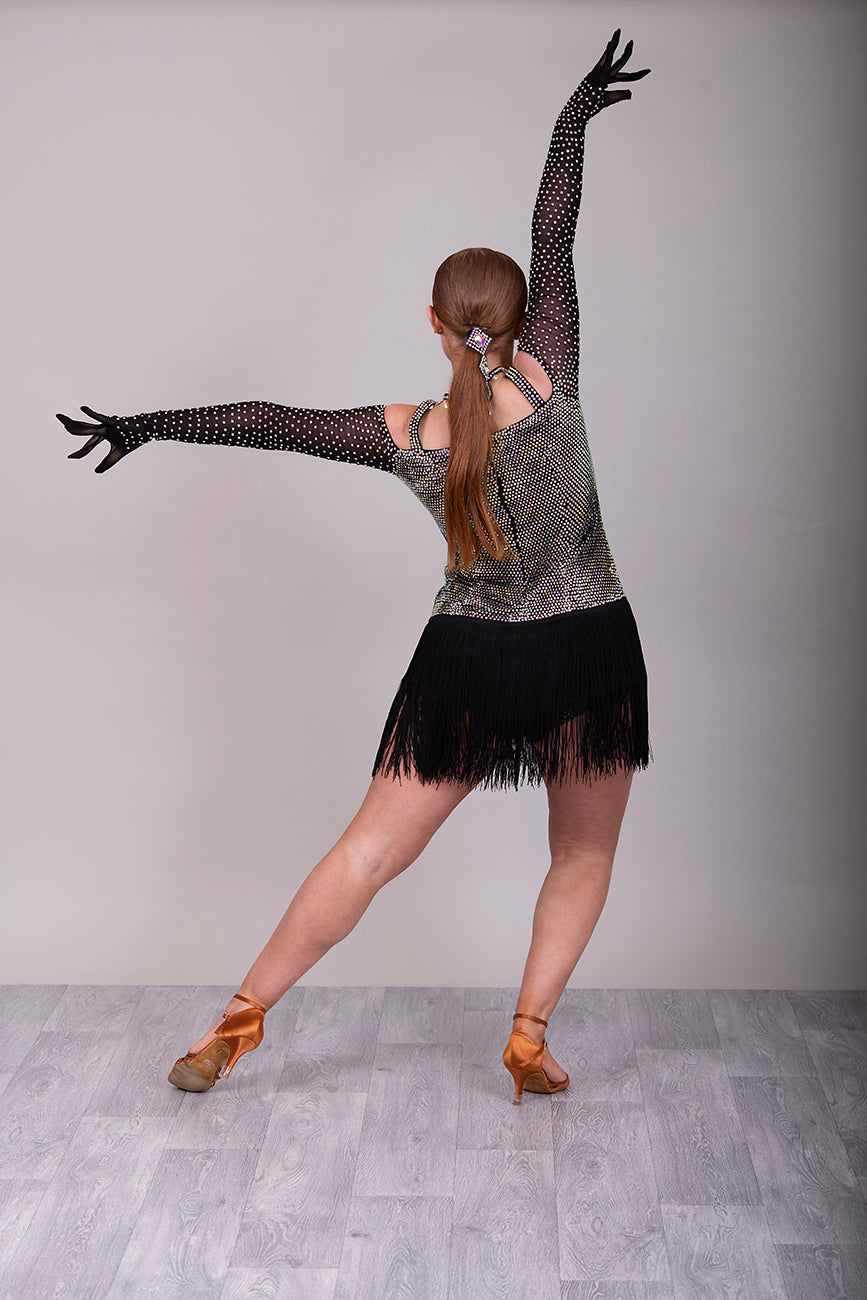 250 Black fringed skirt Latin dress. Solid AB stoning to bodice with cold shoulder black mesh stoned fingered sleeves