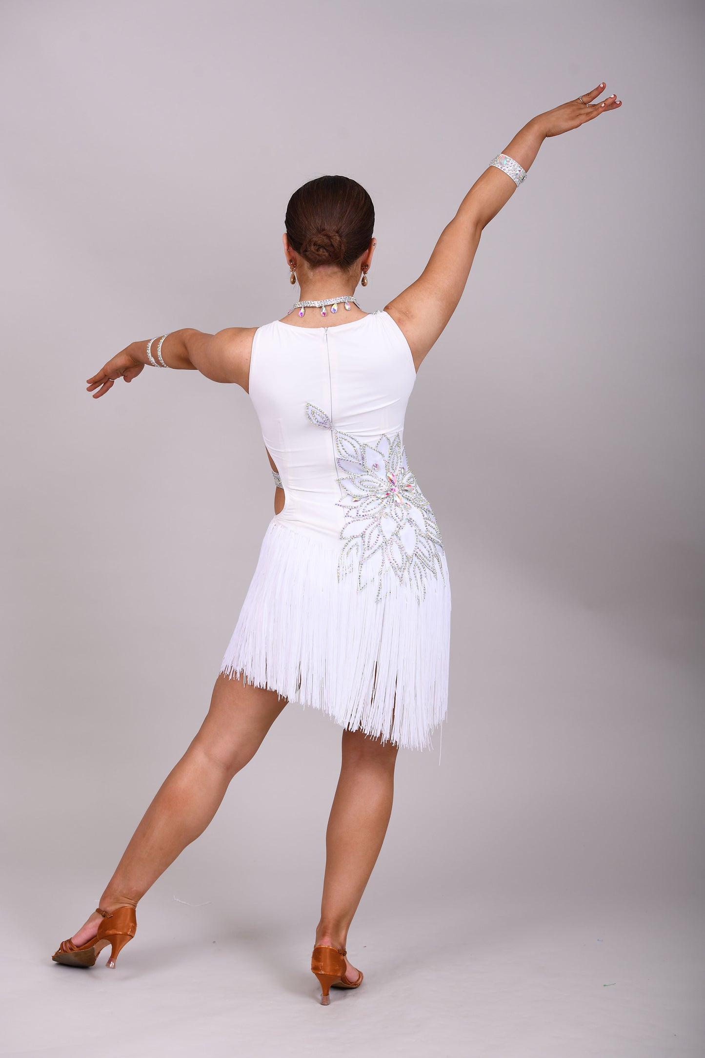 177 White 3D flower & leaf design Latin dress. Fringe skirt with open side detail. Stones all AB