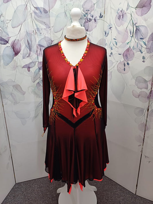 42L Beautiful Black & Orange Competition Latin Dance Dress. Heavily stoned in Hyacinth, Citrine, Hyacinth AB & Jet. Double layer skirt for maximum movement. High back to give option of wearing own bra. ❤️Showroom Appointments Available❤️
