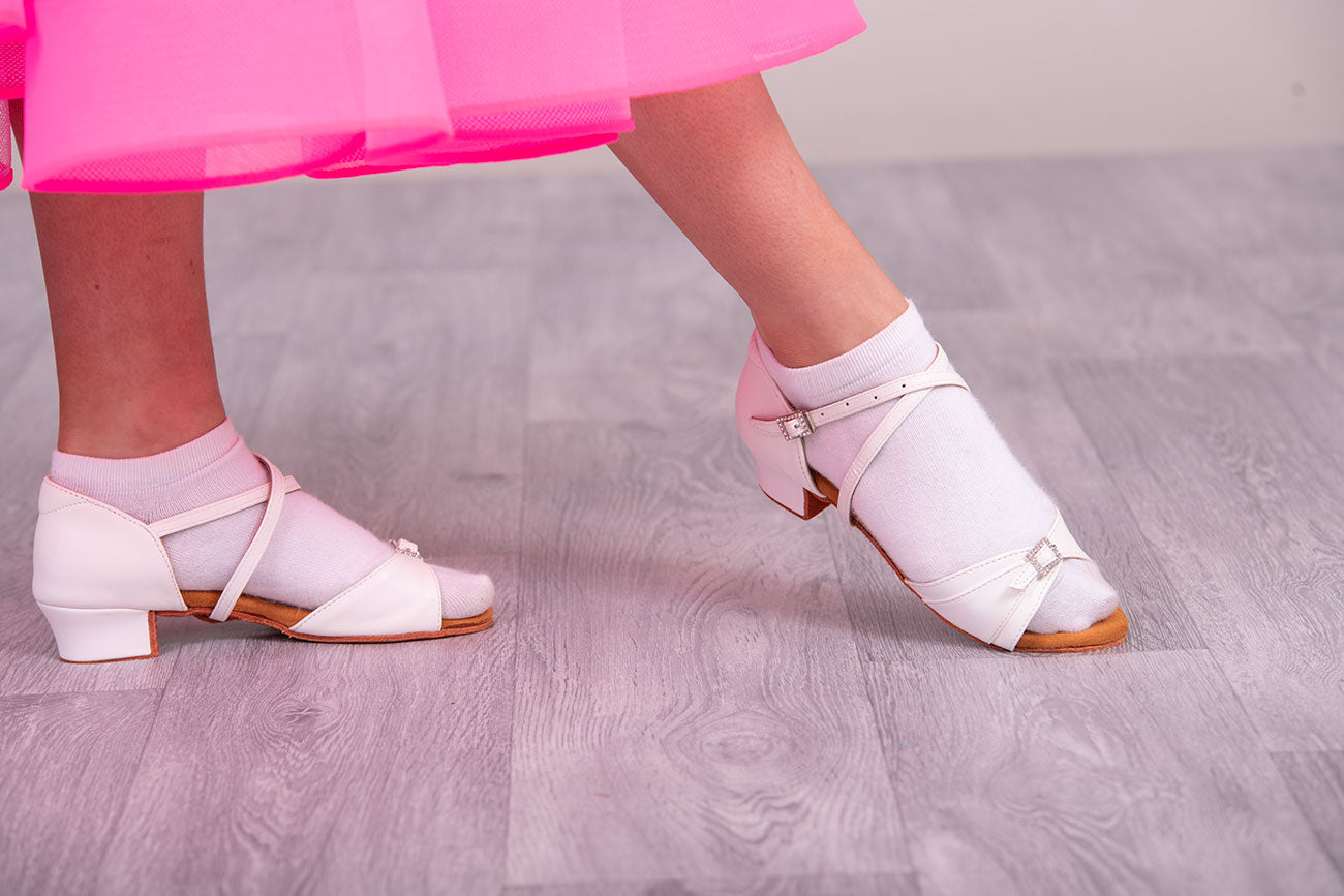 (4) TWD “LULAH” Children’s Ballroom Shoes. White Lattice Design or White with Diamanté Buckle Detail. Each Pair of Shoes comes Boxed & Includes a “Pink Shoe Bag” & pair of plastic feet protectors for trying the Shoes on for Size, Fit & Comfort.