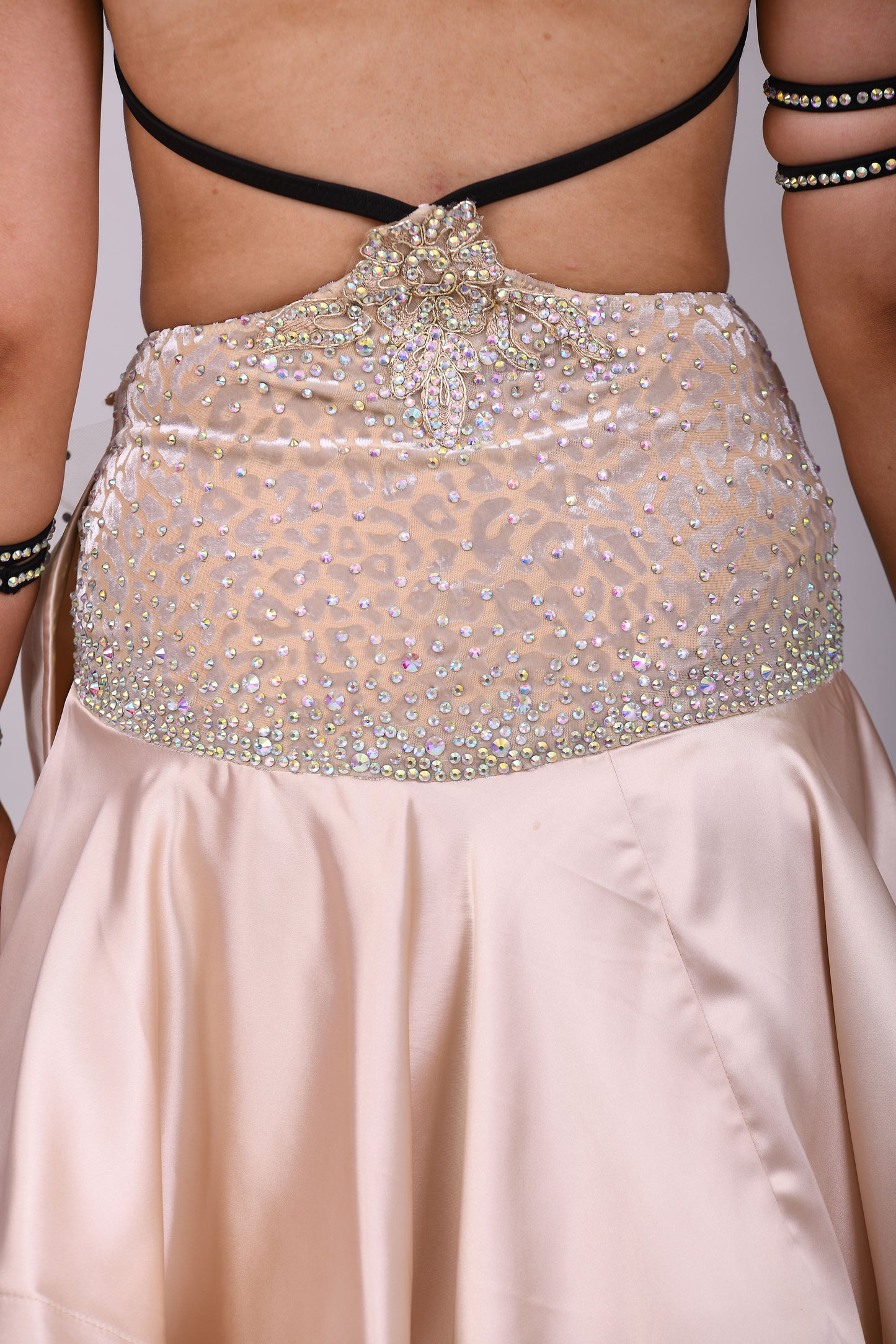 175 Champagne flesh Leopard fabric Latin dress. Soft satin skirt with motif detailing to one hip. Gold appliqué with AB stones