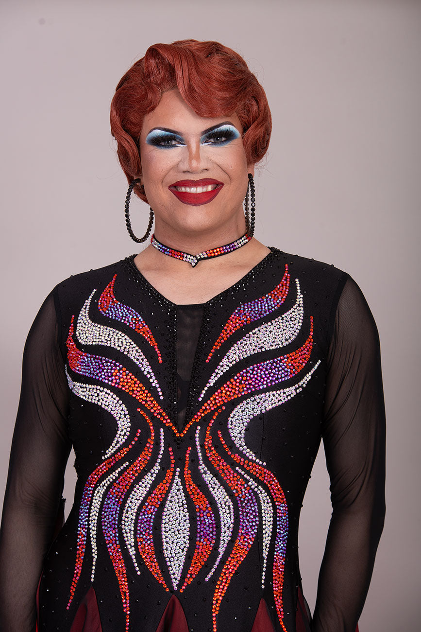 39B Red Black & Orange Ombre Competition Ballroom/Sequence Dance Dress. Ombre stoning in Oranges through to AB. Black & Red Ombre skirts with full back coverage. Detachable Floats complete this beautiful dress