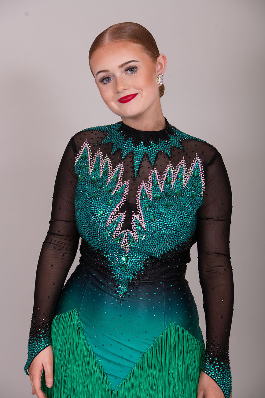 118L TWD ELITE LATIN Competition Latin Dance Dress. Striking Design to front & Back with Ombre Green & Black Lycra Bodice. Full fringed skirts for maximum movement.