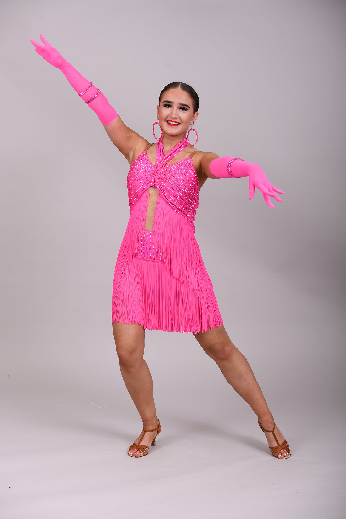 292 Flo Pink full pink fringed Latin dress. Open front detail with gloves, Decorated with Rose stones