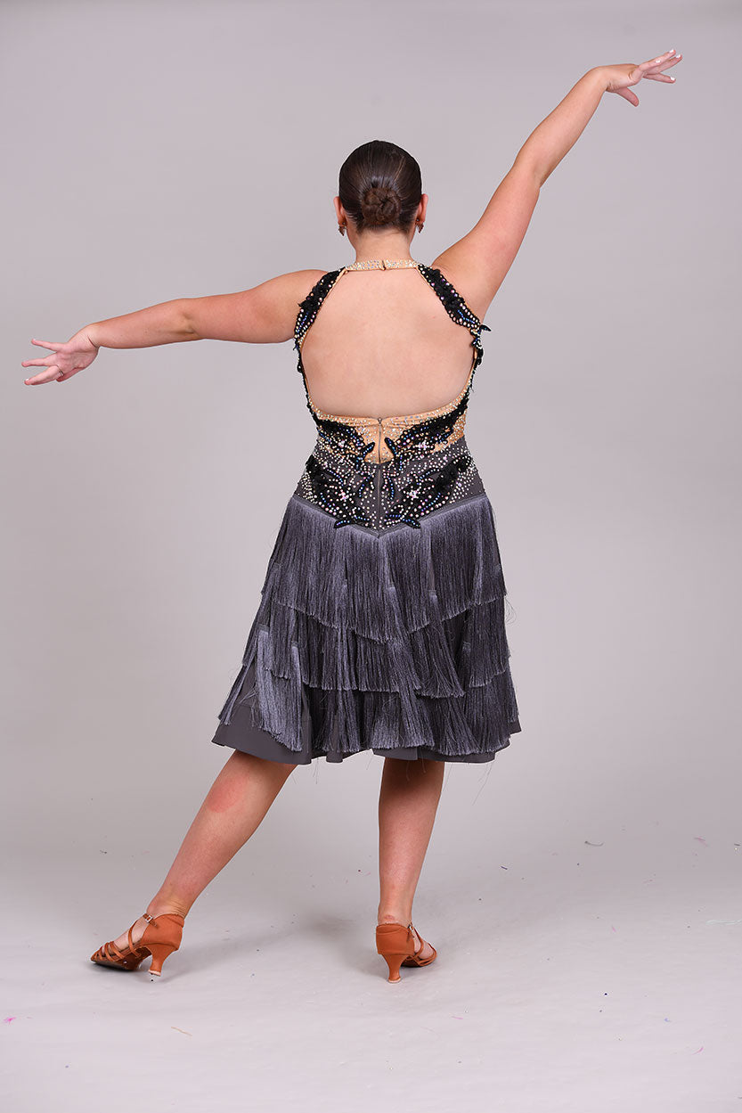 126 Gunmetal Grey layered fringe Latin Dress. Black appliqué on flesh bodice decorated with AB stones.
