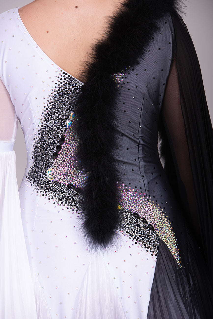 33B  “TWD ELITE” Ballroom/Sequence Competition Dance Dress
High Back allowing option to wear own Bra. Pleated Skirts in Black & White Ombre Pearl Chiffon. Pleated bell sleeve to 1 arm. Finger loop can be added. 
❤️Showroom Appointment Available❤️