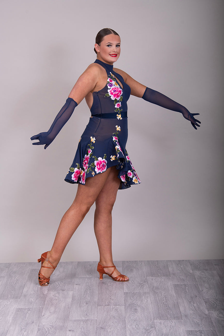 143 Navy blue fine mesh Latin dress with multi coloured Embroidered Floral Appliqués. Keyhole halter neck detail. Unstoned