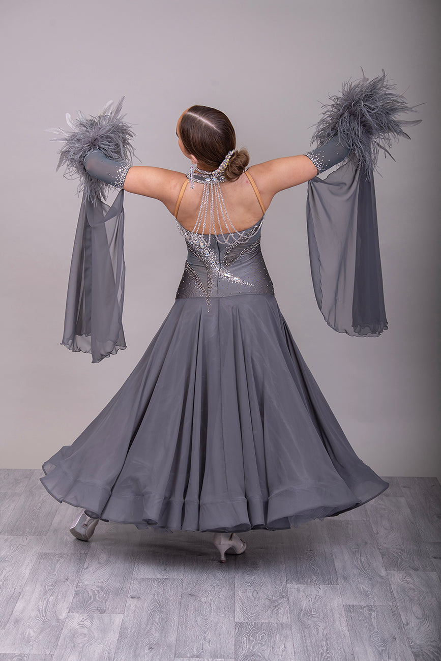 18B “TWD ELITE” Hematite Ballroom/Sequence Competition Dance Dress. new fuller skirts/underskirts. Heavily Stoned in AB, Moonlight & Jet Hematite. Detachable Floats & extra Feather Cuffs. Necklace with hanging details to the back.