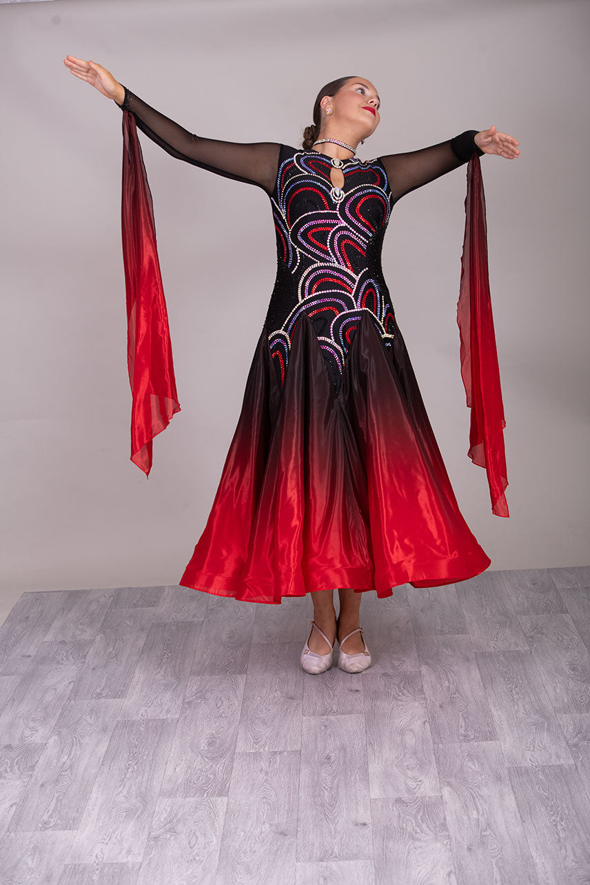 32B Black & Red Ombre Competition Ballroom/Sequence Dance Dress. Stoned in jet, AB, Siam & Light Siam. Very classy design giving full front & sleeve coverage and lovely back opening.