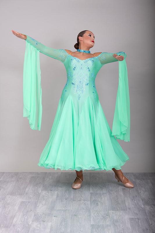 14B Pretty Green Ballroom/Sequence Competition Dance Dress. Elegant Neckline with cold shoulder sleeves. Beautiful stoning design in pale green, green & AB. Detachable Floats