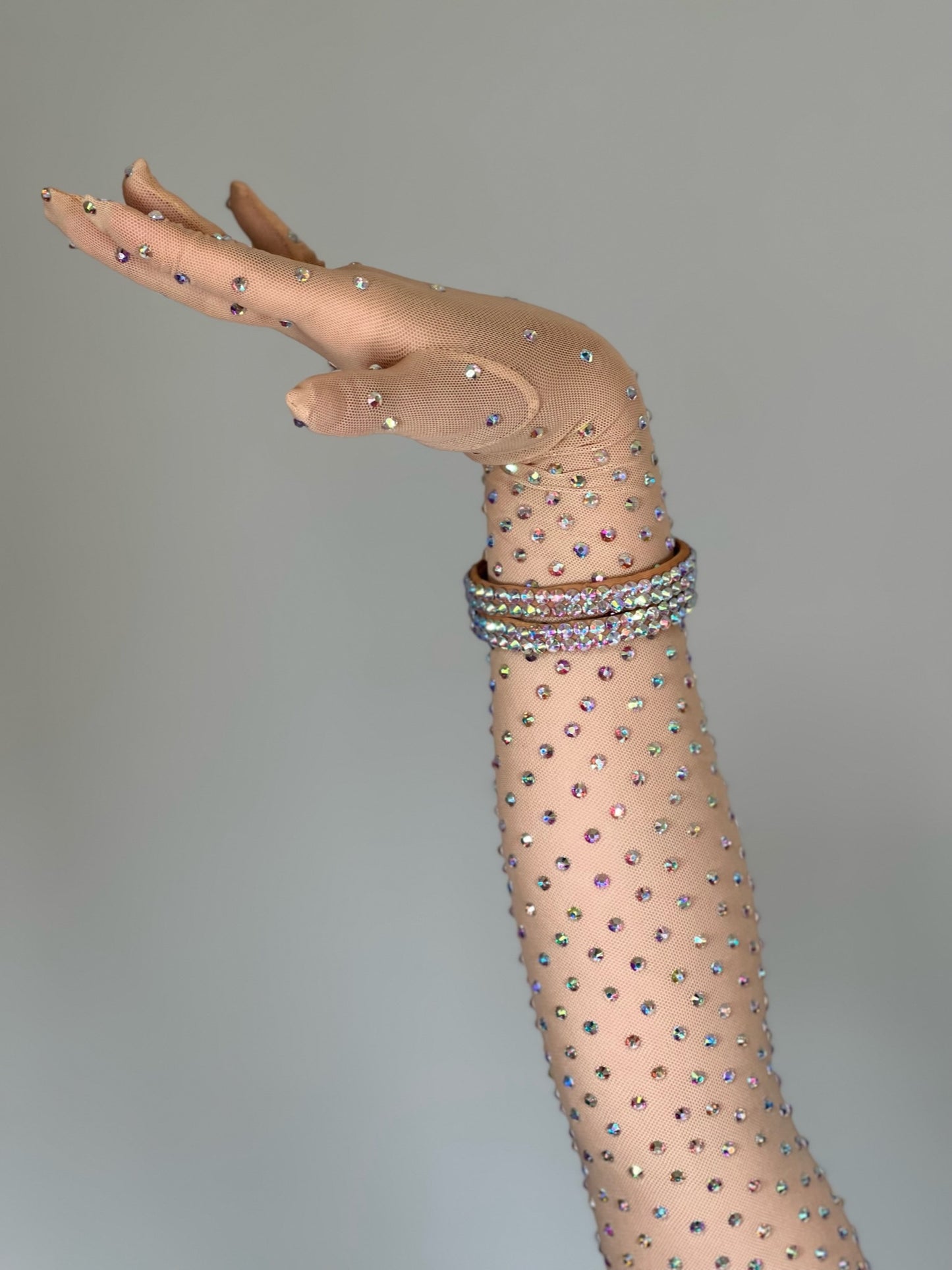 V52 Lucia Plain (£20) & Amara Stoned (£45) Gloves with fingers. Available in Flesh & Tan. Add Bangles or Bracelets for that perfect look.