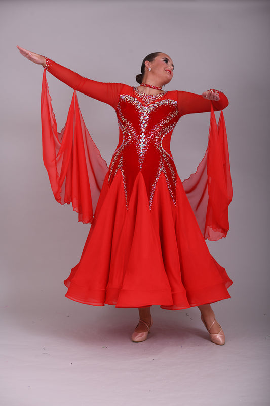 055 Red Competition Ballroom Dance Dress. Red Velvet Panels to the bodice. Heavily decorated in Siam & AB