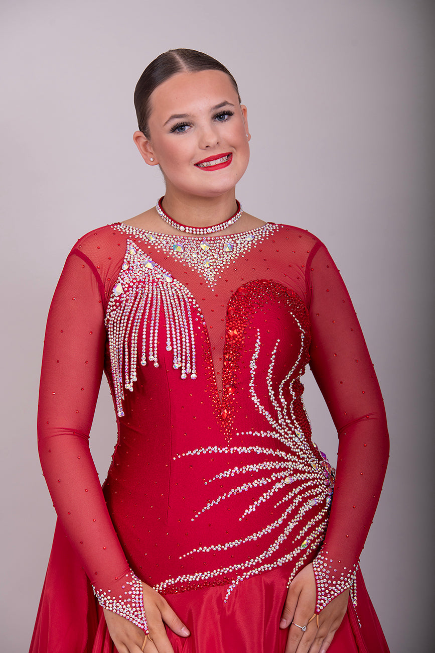099 Wine Competition Ballroom Dance Dress heavily decorated with Dark Siam & AB stones. Hanging stoned strap detailing to the right upper chest.  High back giving option to wear own Bra.