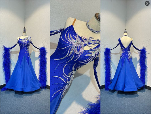 71B Cobalt Blue Competition Ballroom Dance Dress. Heavily decorated in Sapphire & AB. Detachable Ostrich Feather floats. ❤️Showroom Appointments Available❤️