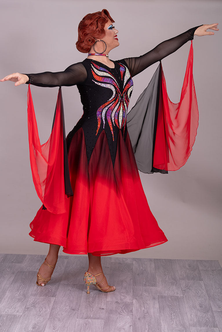 39B Red Black & Orange Ombre Competition Ballroom/Sequence Dance Dress. Ombre stoning in Oranges through to AB. Black & Red Ombre skirts with full back coverage. Detachable Floats complete this beautiful dress