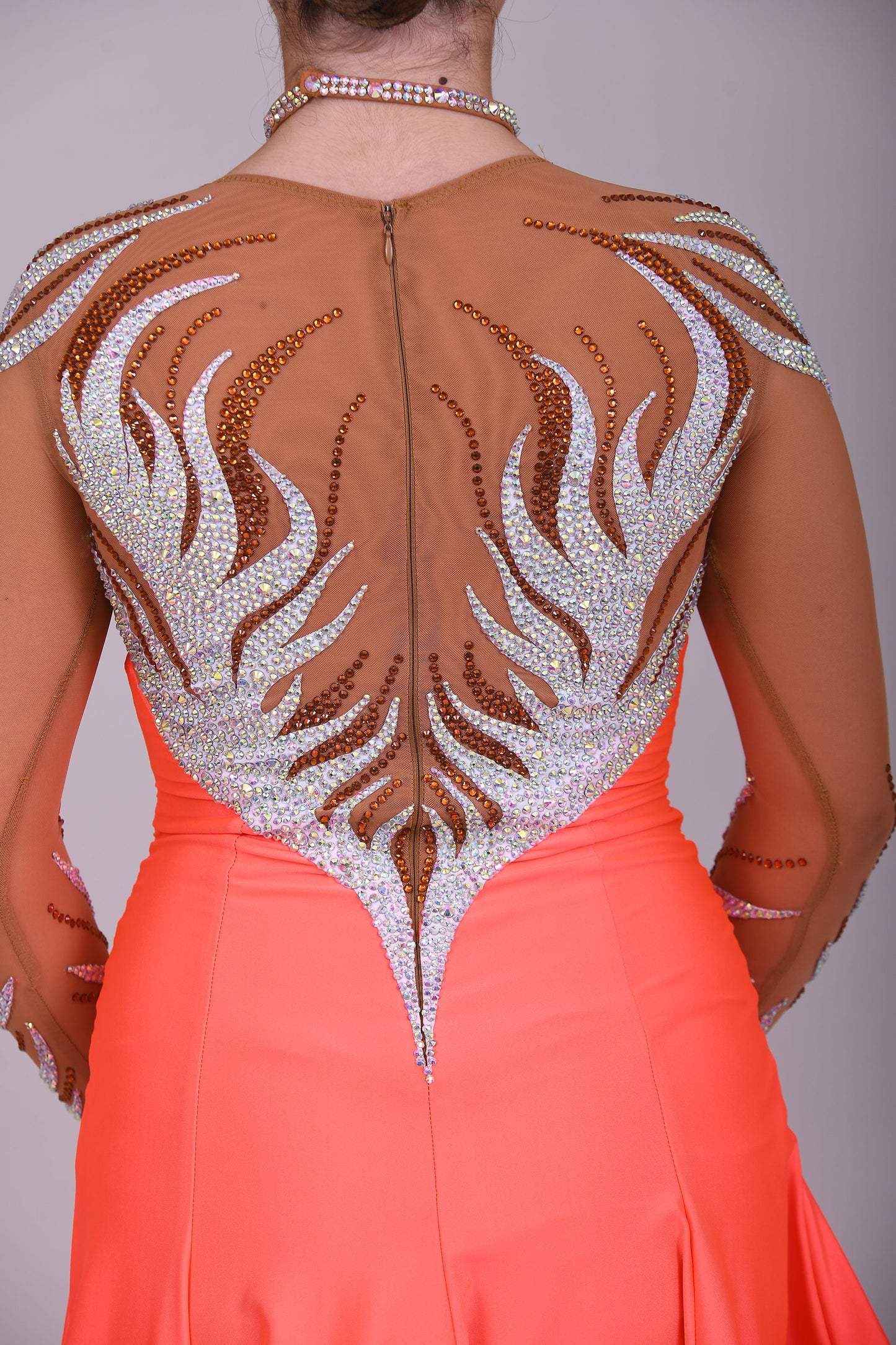 228 Orange & Tan Latin Dress. Heavy decoration design to the front & back. Small split to the left front side. High back with zip. Stoned in smoked topaz & AB