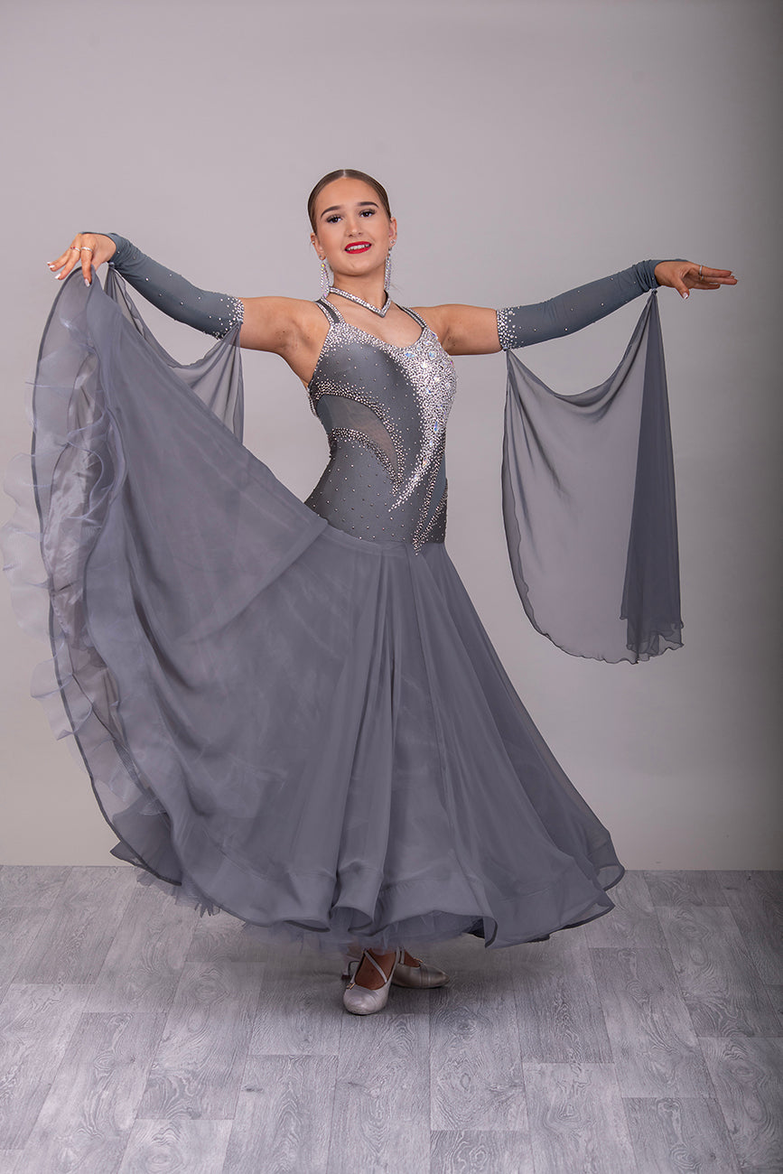 18B “TWD ELITE” Hematite Ballroom/Sequence Competition Dance Dress. new fuller skirts/underskirts. Heavily Stoned in AB, Moonlight & Jet Hematite. Detachable Floats & extra Feather Cuffs. Necklace with hanging details to the back.