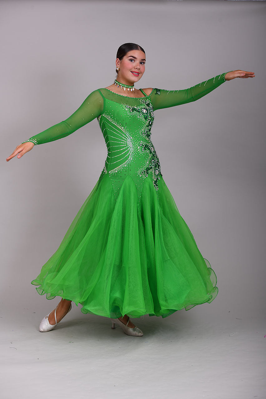 010 Apple Green one Shoulder, one cold shoulder Ballroom Dress. Appliqué stoned in AB & Jade to one side of the bodice.