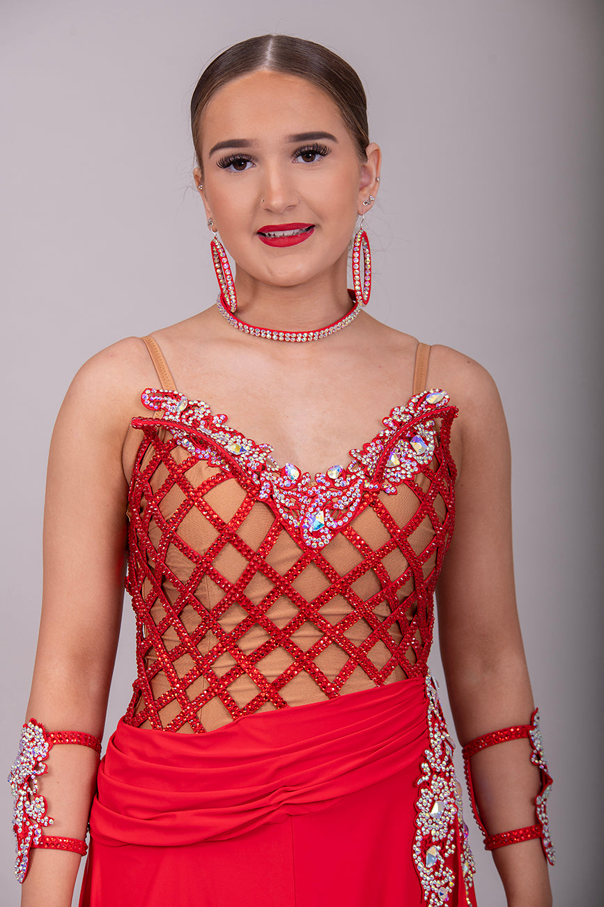 13L Red Fishnet & Flesh Competition Latin/Rhythm Dress. Heavily stoned in Light Siam & AB with decorative side panel.