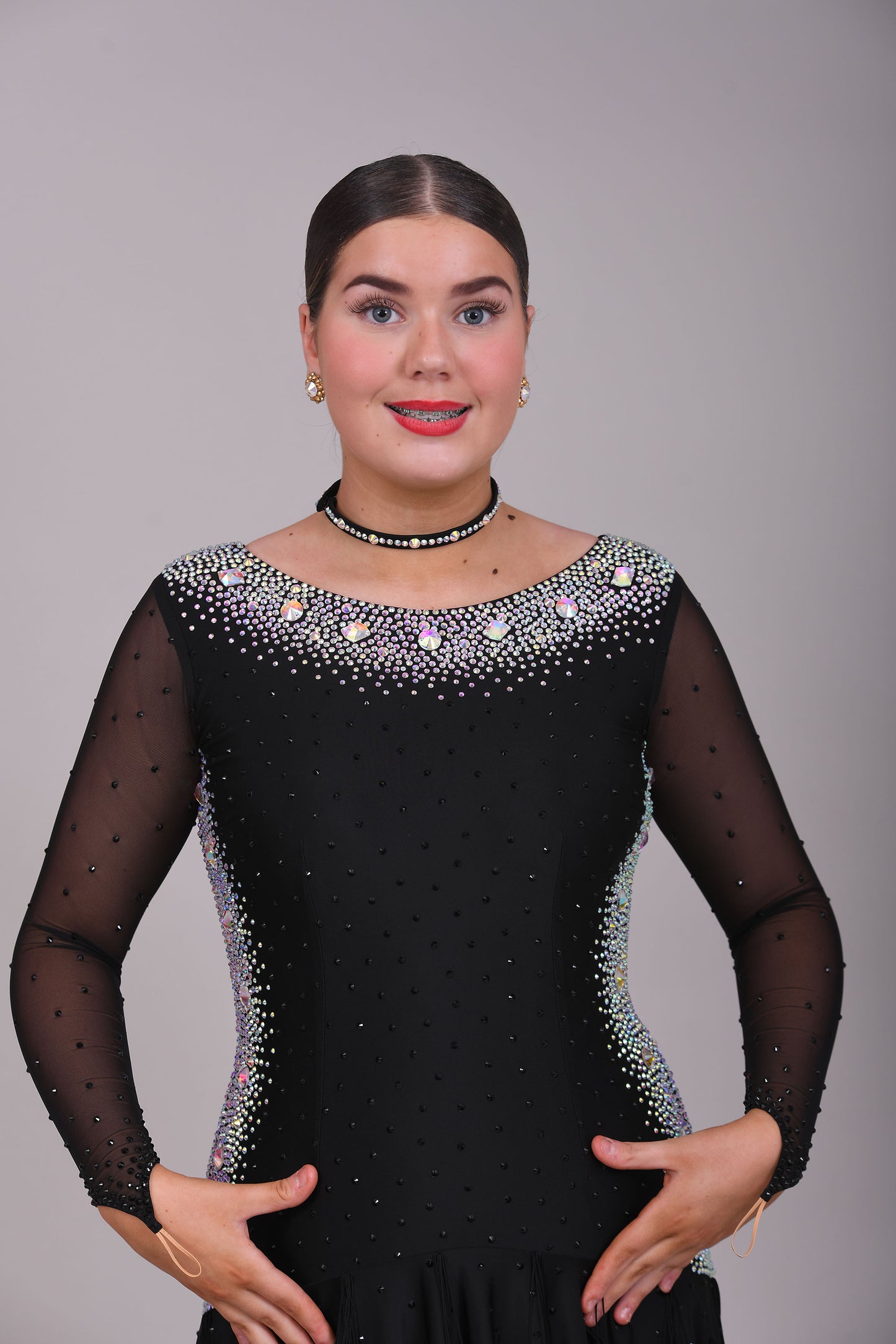 230 Black Latin dress. Stoning in AB to the sides back and back detailing. Fringe & stone detail to the handkerchief skirt