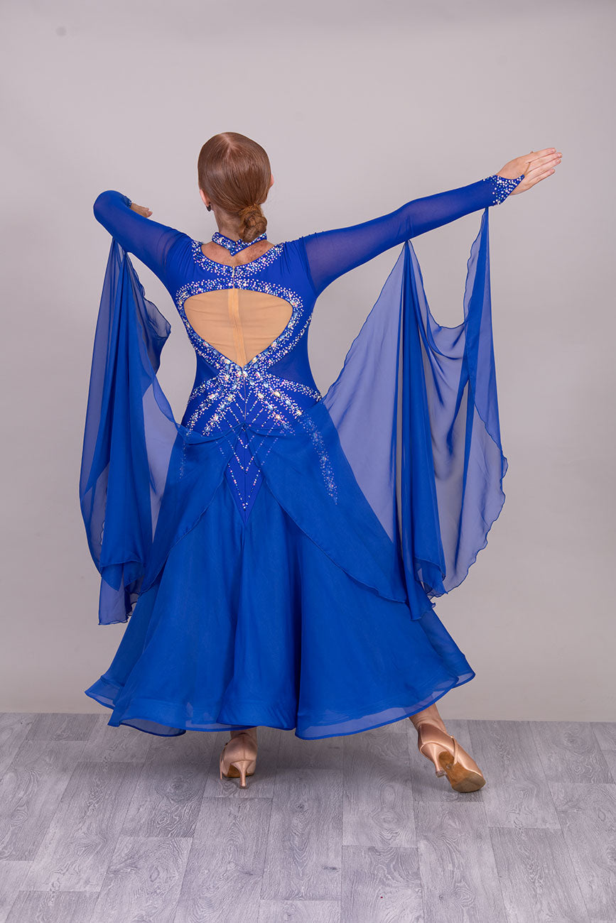 54B Royal Blue Competition Dance Dress. Filled in back to give option of wearing own Bra. Stoned in Sapphire, light sapphire & AB. ❤️Showroom Appointments Available❤️
