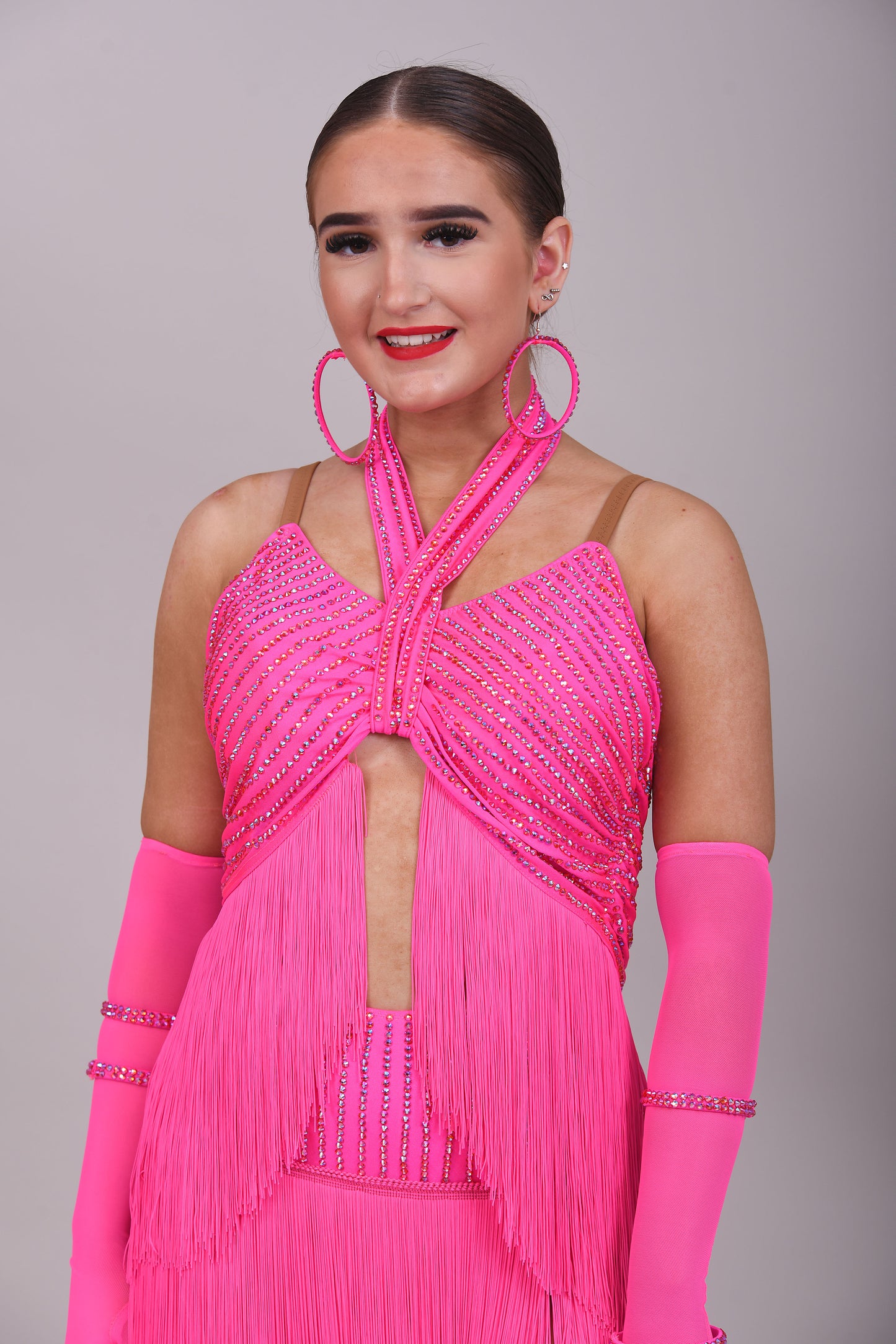 292 Flo Pink full pink fringed Latin dress. Open front detail with gloves, Decorated with Rose stones