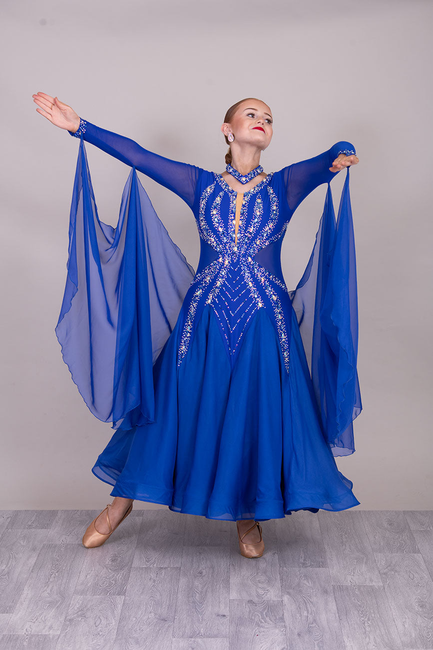 54B Royal Blue Competition Dance Dress. Filled in back to give option of wearing own Bra. Stoned in Sapphire, light sapphire & AB. ❤️Showroom Appointments Available❤️