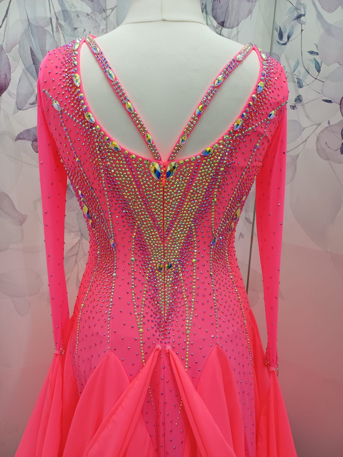 66B Coral Competition Ballroom Dance Dress. Striking decoration in AB, Coral & Coral AB. Strappy detail to upper chest & back. High back for option to wear own Bra. Detachable Floats ❤️Showroom Appointments Available❤️