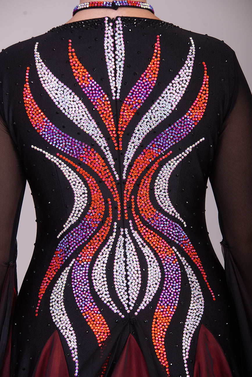 39B Red Black & Orange Ombre Competition Ballroom/Sequence Dance Dress. Ombre stoning in Oranges through to AB. Black & Red Ombre skirts with full back coverage. Detachable Floats complete this beautiful dress