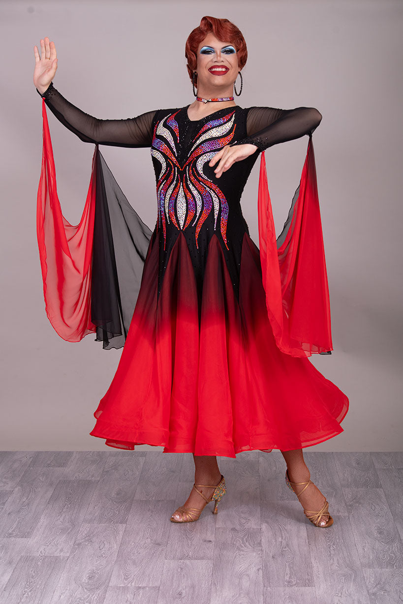 39B Red Black & Orange Ombre Competition Ballroom/Sequence Dance Dress. Ombre stoning in Oranges through to AB. Black & Red Ombre skirts with full back coverage. Detachable Floats complete this beautiful dress