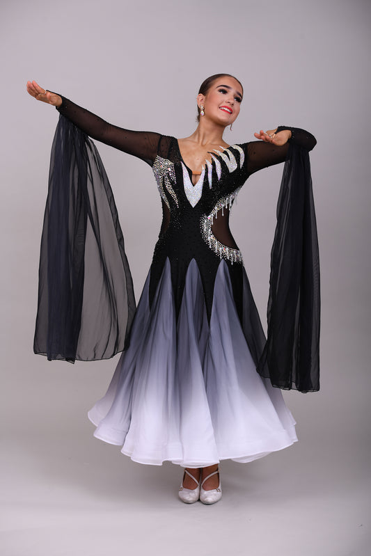 331 White & Black Ombré Ballroom Dress. Detailing to the chest and back. Decorated in Jet and AB stones with floats from the lower arm.
