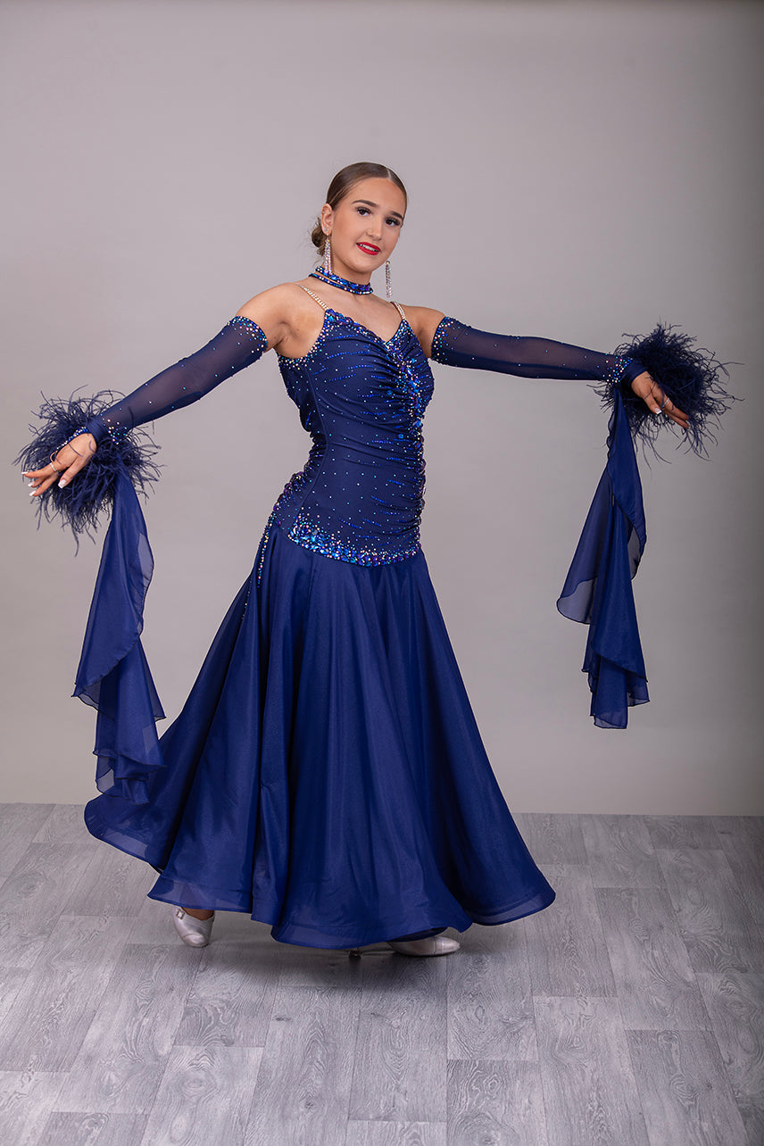 07B Navy Blue Ballroom/Sequence Competition Dance Dress. Stunning Bodice Detail stoned in Sapphire, Capri Blue, Capri Blue AB & Sapphire AB. Cones with Gloves & Ostrich feather cuffs with hanging floats.