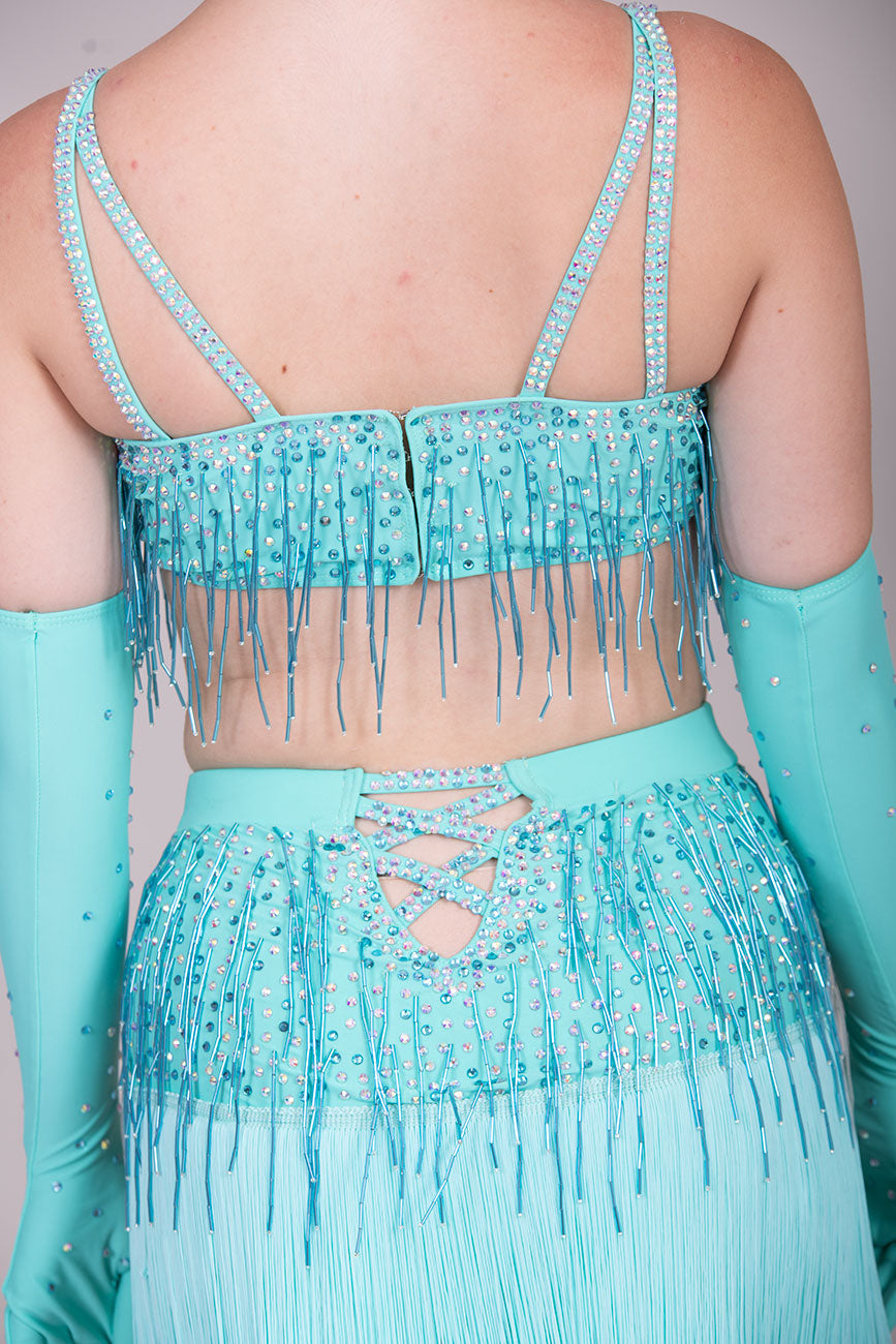 (BUDGET)14 Aqua 2 piece Stunning Colour Competition Latin Dance Dress. Bead droppers on the bra top & skirt has beads & fringing. Separate gloves with fingers to finish this look.