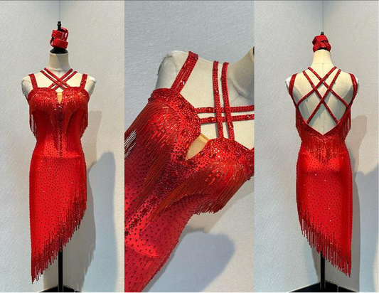 41L Red Latin Competition Dance Dress. Stoned in light Siam with strapping feature to the back & front. Bead droppers added to the hem for movement & upper chest.