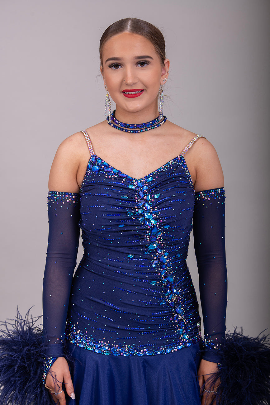 07B Navy Blue Ballroom/Sequence Competition Dance Dress. Stunning Bodice Detail stoned in Sapphire, Capri Blue, Capri Blue AB & Sapphire AB. Cones with Gloves & Ostrich feather cuffs with hanging floats.