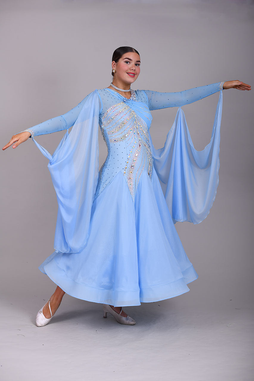 007 Light Blue Competition Ballroom Dance Dress. Heavily stoned in AB & Blue. Mesh overlay to one side of the bust continuing round to the back. Comes with detachable floats.