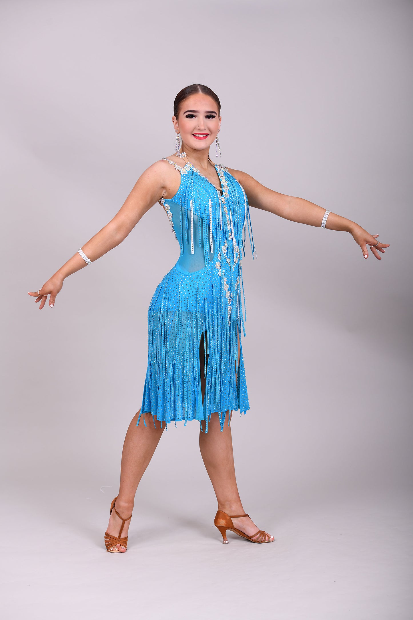 312 Paradise Blue Latin Dress with AB material stoned droppers. AB Stones with Gloves