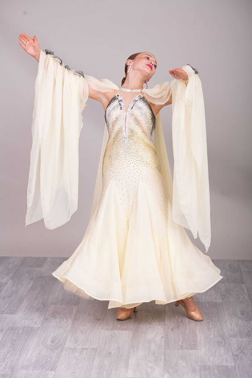 38B TWD PETITE Lemon & Silver Competition Ballroom/Sequence Dress
Stunning Flower detailing to the arm sleeve floats with 
Heavily stoned fabric droppers on the back. Very unusual neck/Shoulder