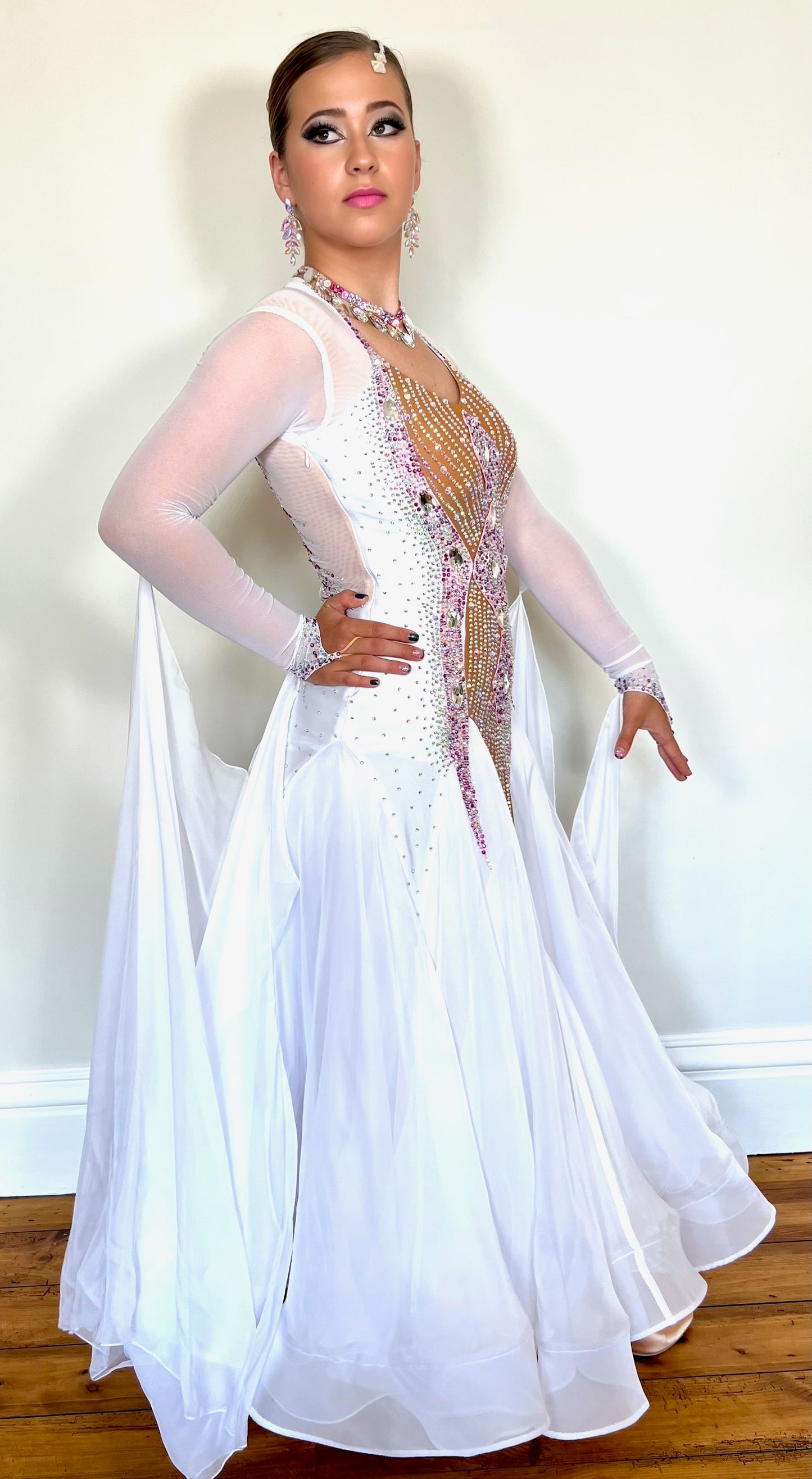 247 White and Tan Ballroom Dress. Stunning decoration stoned in AB & light rose. Floats to sleeves & back.