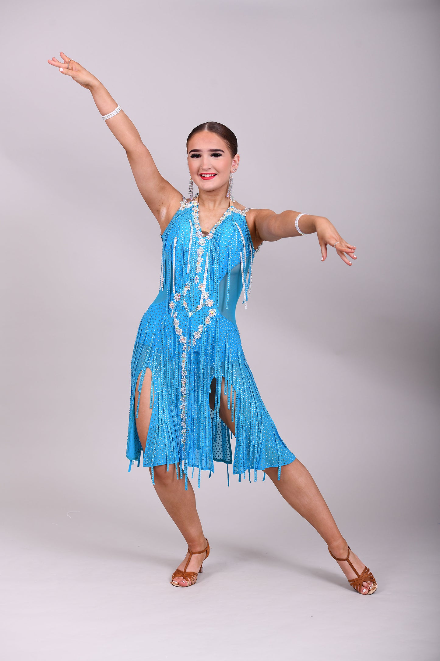 312 Paradise Blue Latin Dress with AB material stoned droppers. AB Stones with Gloves