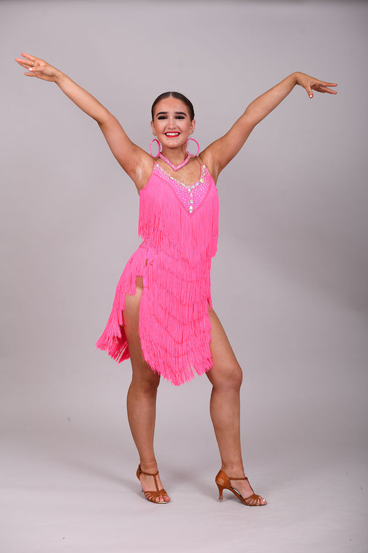 303 Flo Pink Latin Dress. Full fringed skirt decorated in AB Stones & open back detail