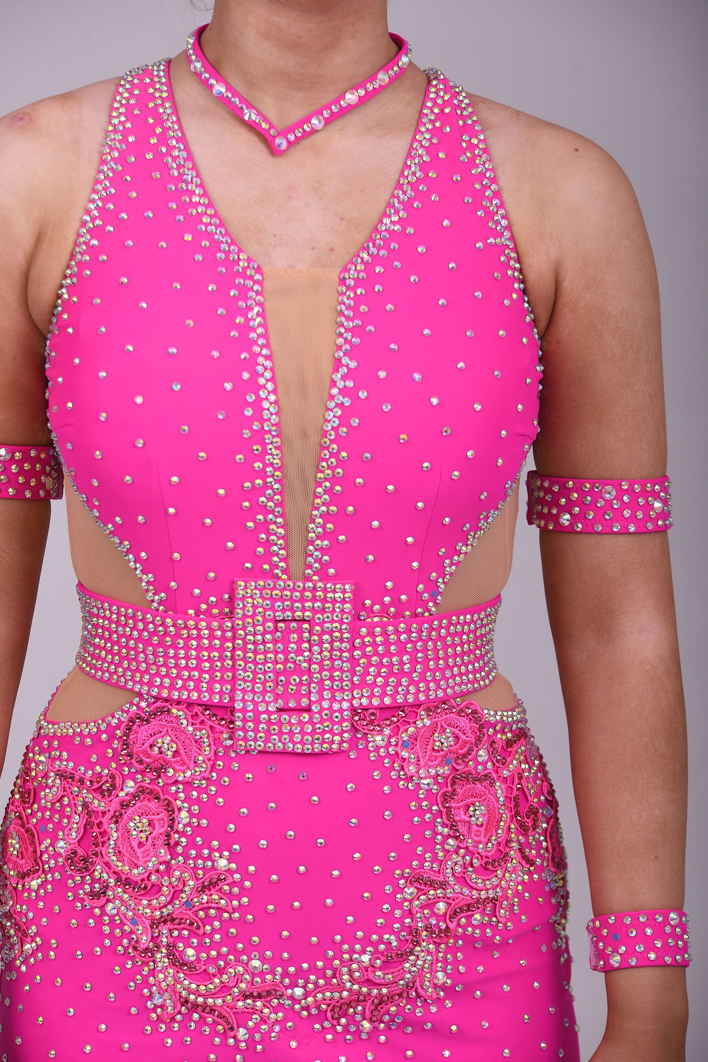 156 Flo Pink cut out Latin Dress. Full frill skirt with detachable belt. Flo pink appliqués decorated in Rose & AB stones